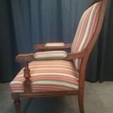 Pair of Louis XVI style walnut armchairs