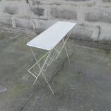 Vintage magazine holder in perforated metal
