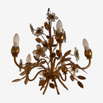 Golden metal chandelier decorated with foliage and flowers circa 1960