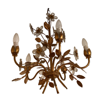 Golden metal chandelier decorated with foliage and flowers circa 1960
