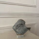 Marble sculpture in the shape of a fish.