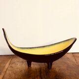 Large Céramidi tripod cup. Yellow and black. Signature incised Céramidi