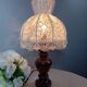 Table lamp with romantic wood and lace ambiance, retro chic