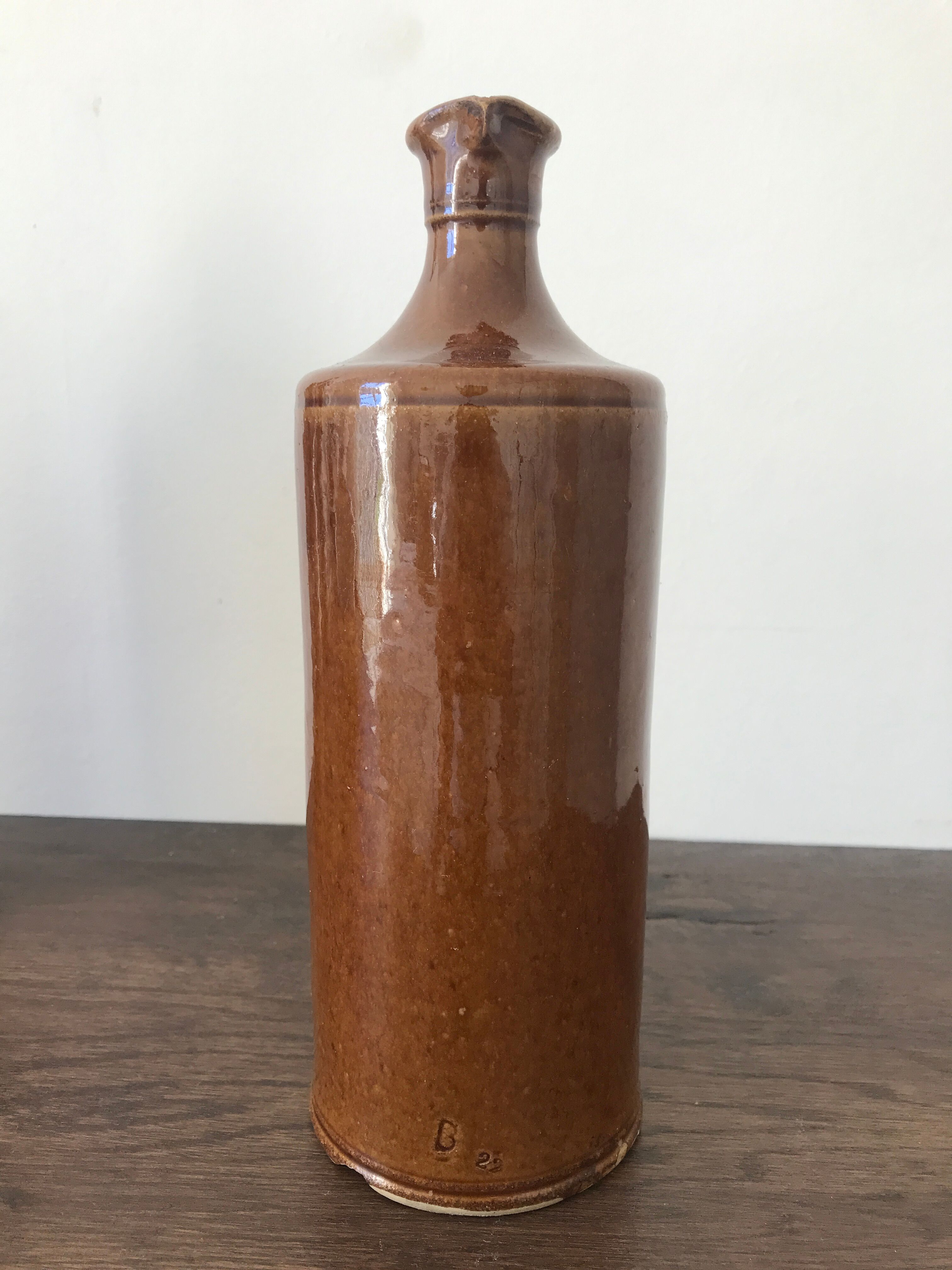 Pair of sandstone bottles