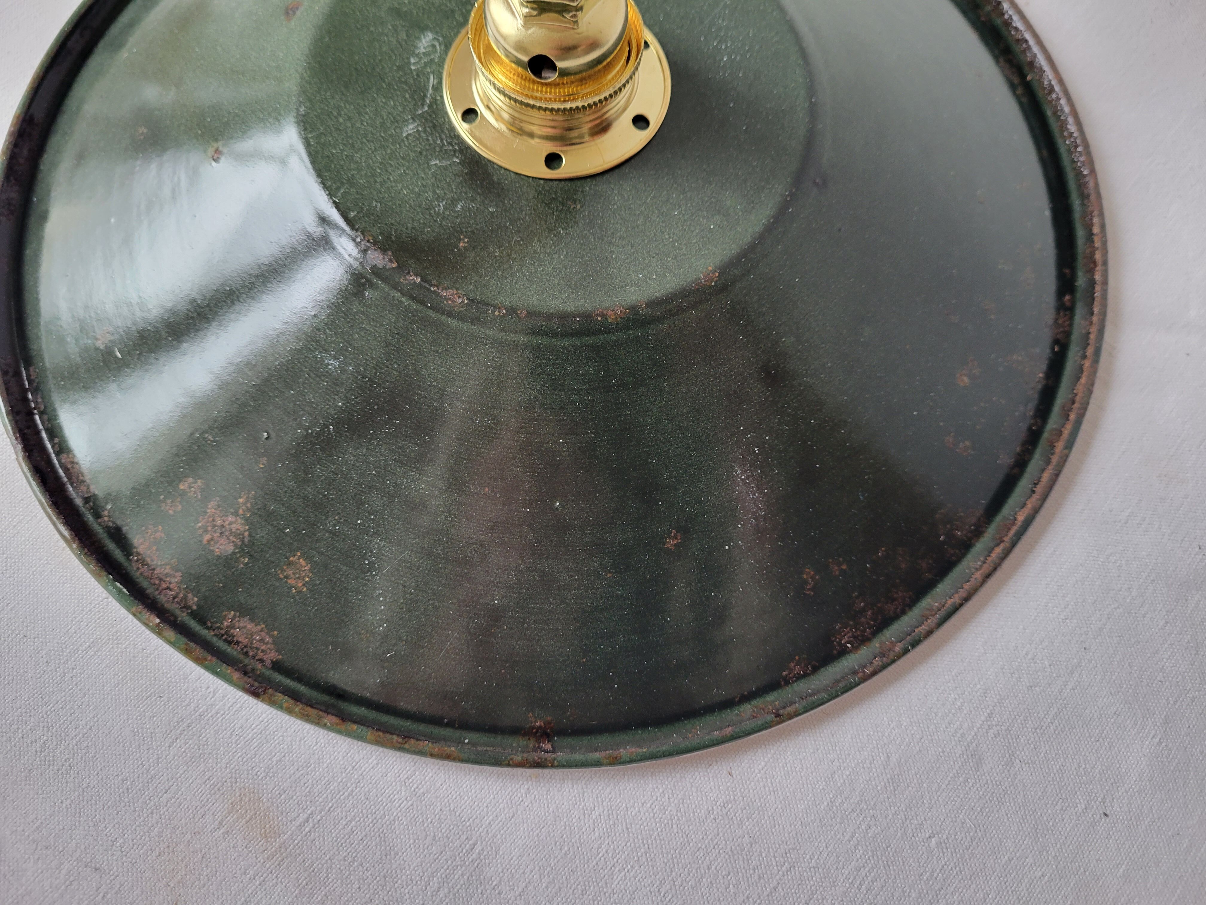 Enamelled sheet metal suspension