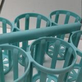 Vintage blue plastic bottle holder