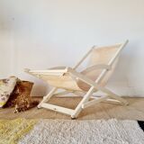 Old white wood deck chair Triconfort