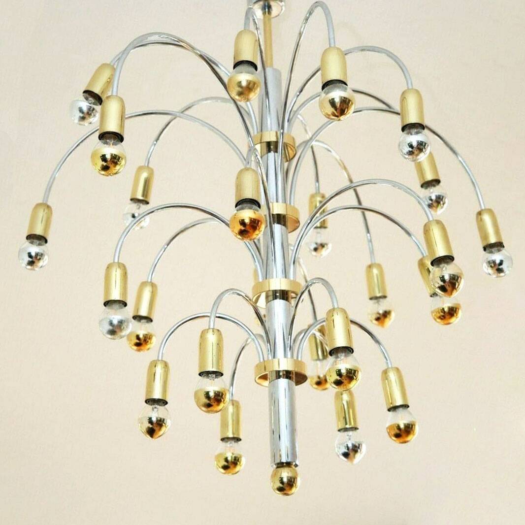 Post-modern chandelier with 24 lights in chrome and gold metal, Germany, 1970.