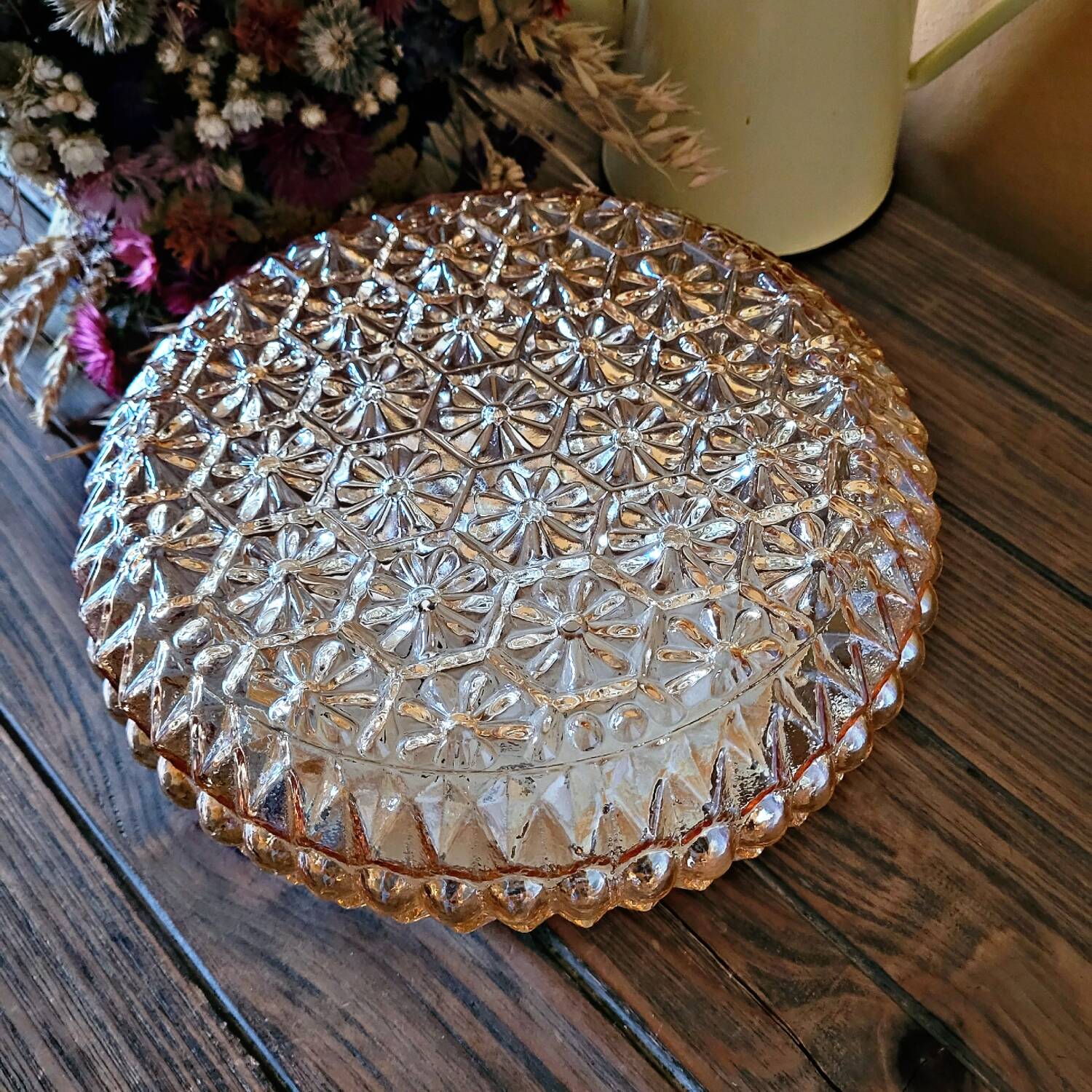Large vintage ceiling or wall lamp in tinted molded glass with flower decoration