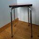 Chrome metal and orange formica stool