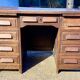 Antique American-style vintage desk with pedestal