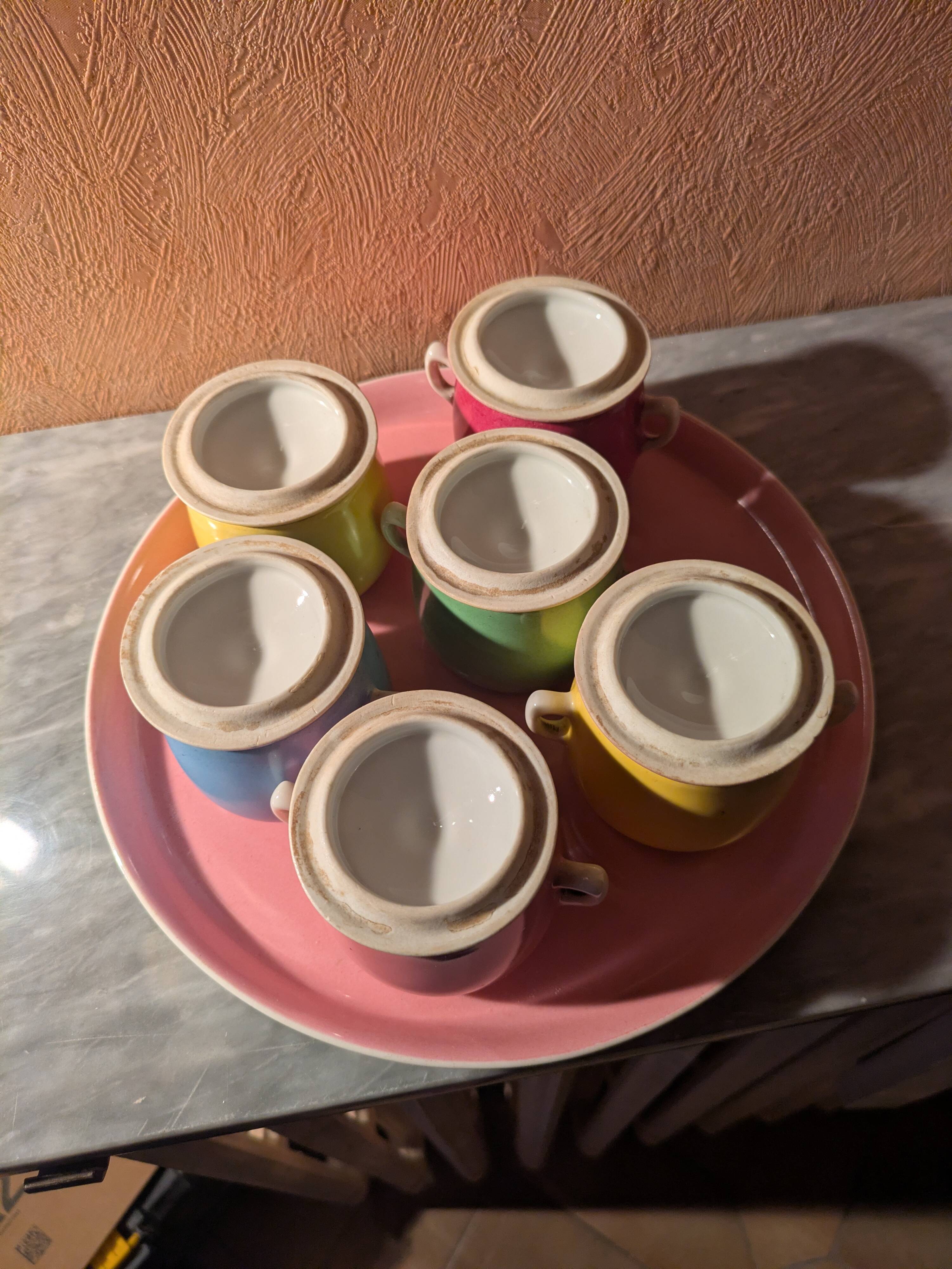 6 small porcelain cream pots from Limoges with a tray.