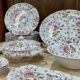 English porcelain service by Johnson Bros model Rose Chintz.