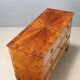 Neoclassical commode in walnut and burl.