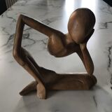 Pensive man wooden statue