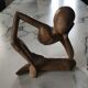 Pensive man wooden statue