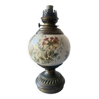 Old oil lamp with flower decor