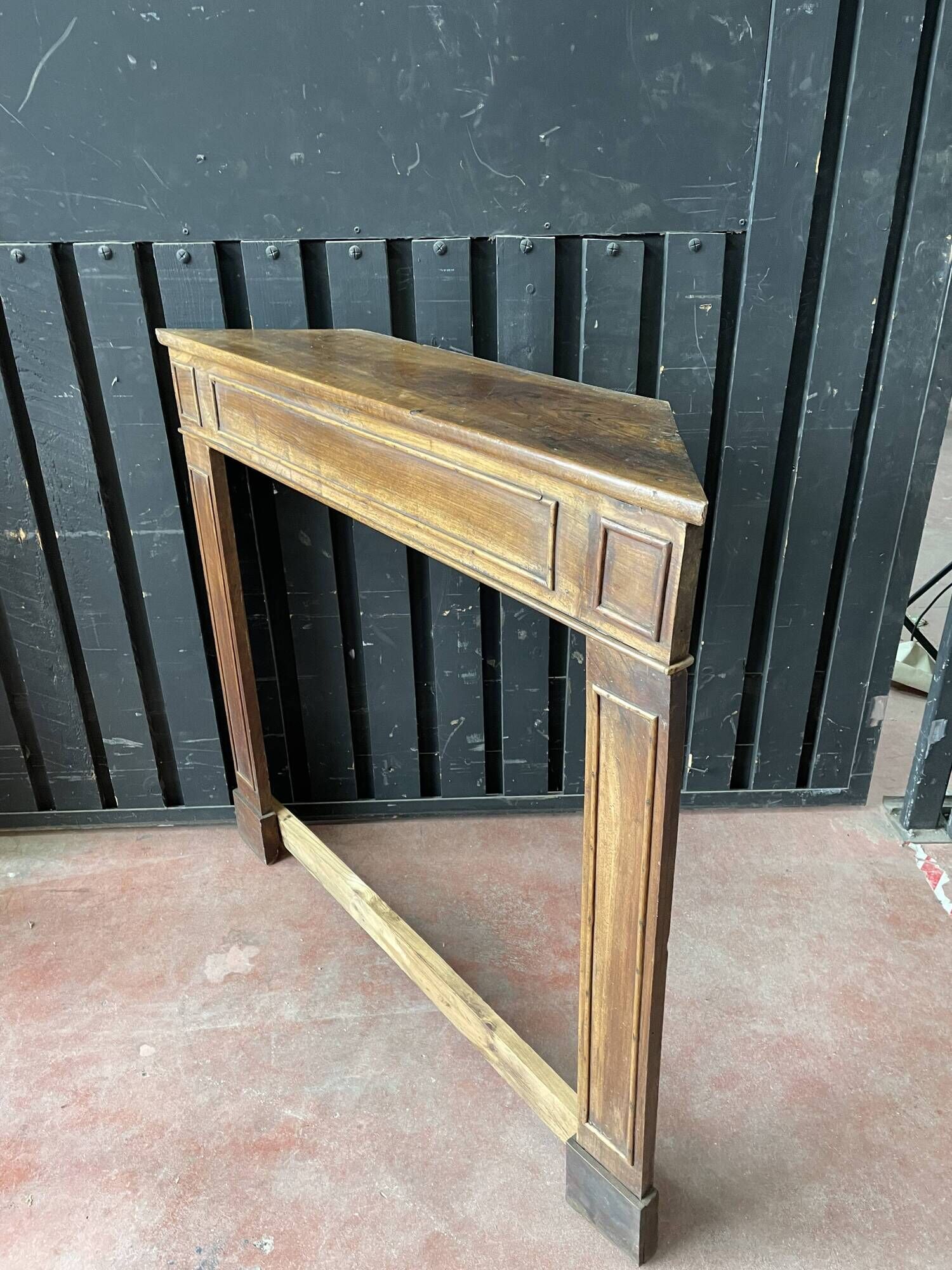 Front or frame or facade of fireplace of the nineteenth century in walnut wood carved by hand.