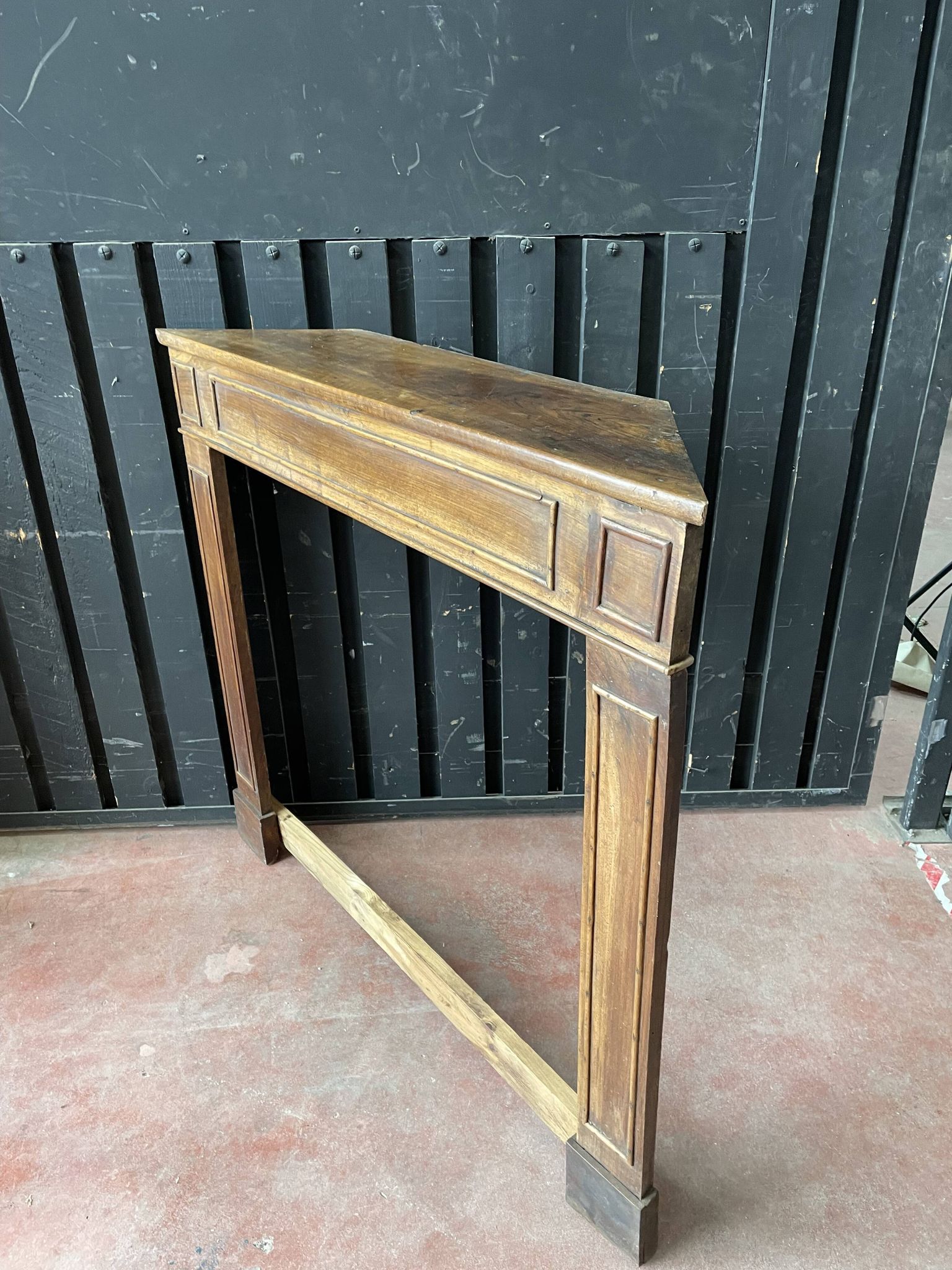 Front or frame or facade of fireplace of the nineteenth century in walnut wood carved by hand.