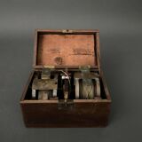 Two reel spools in their original 1900 box