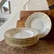 Set of 6 hollow plates in white and gold porcelain