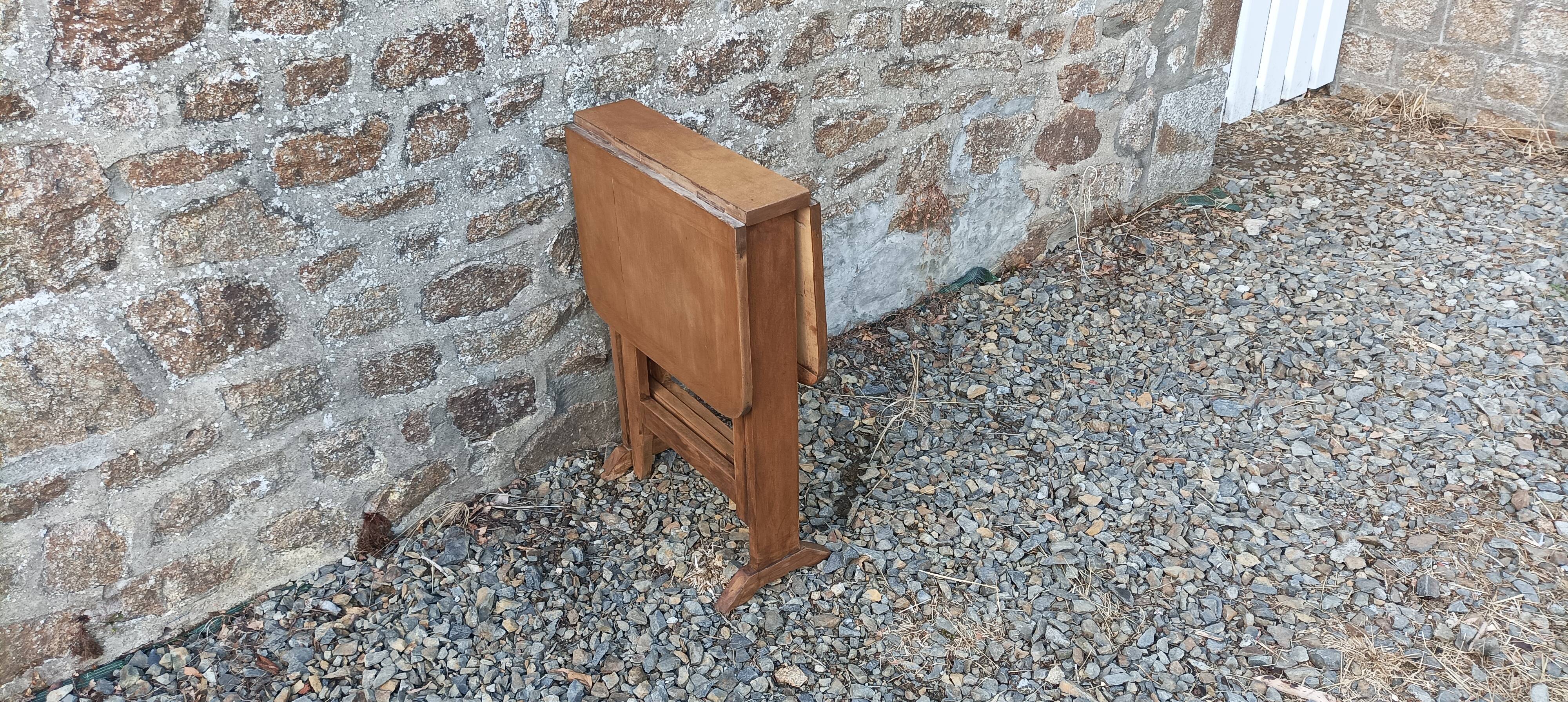 Old wooden table with double swings
