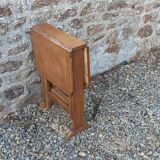 Old wooden table with double swings