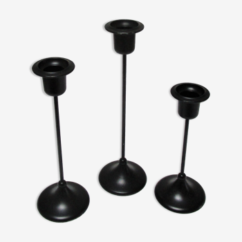 Three Scandinavian black lacquered metal candle holders