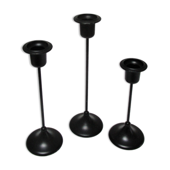 Three Scandinavian black lacquered metal candle holders