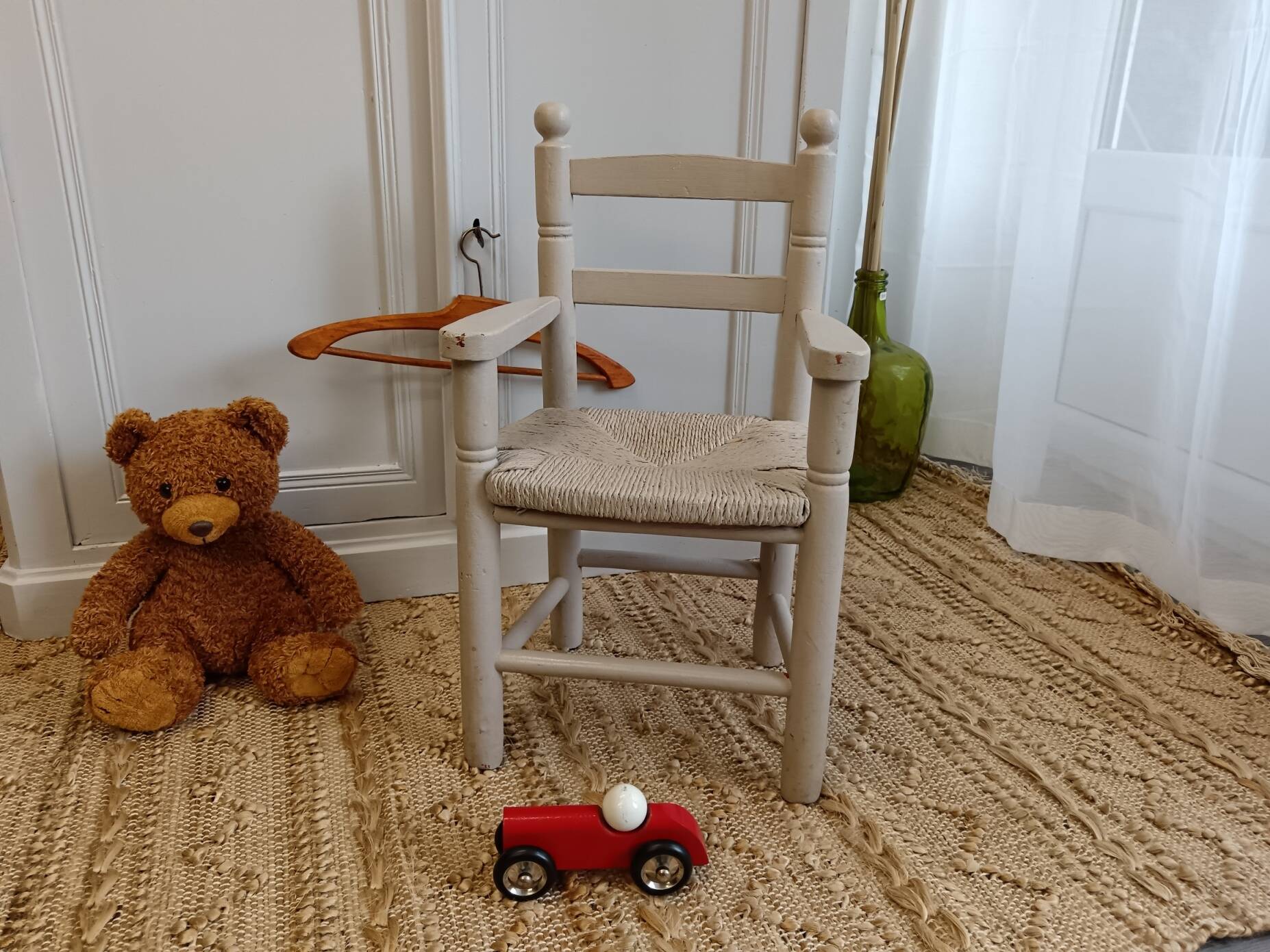 Grey patinated children's armchair with straw seat