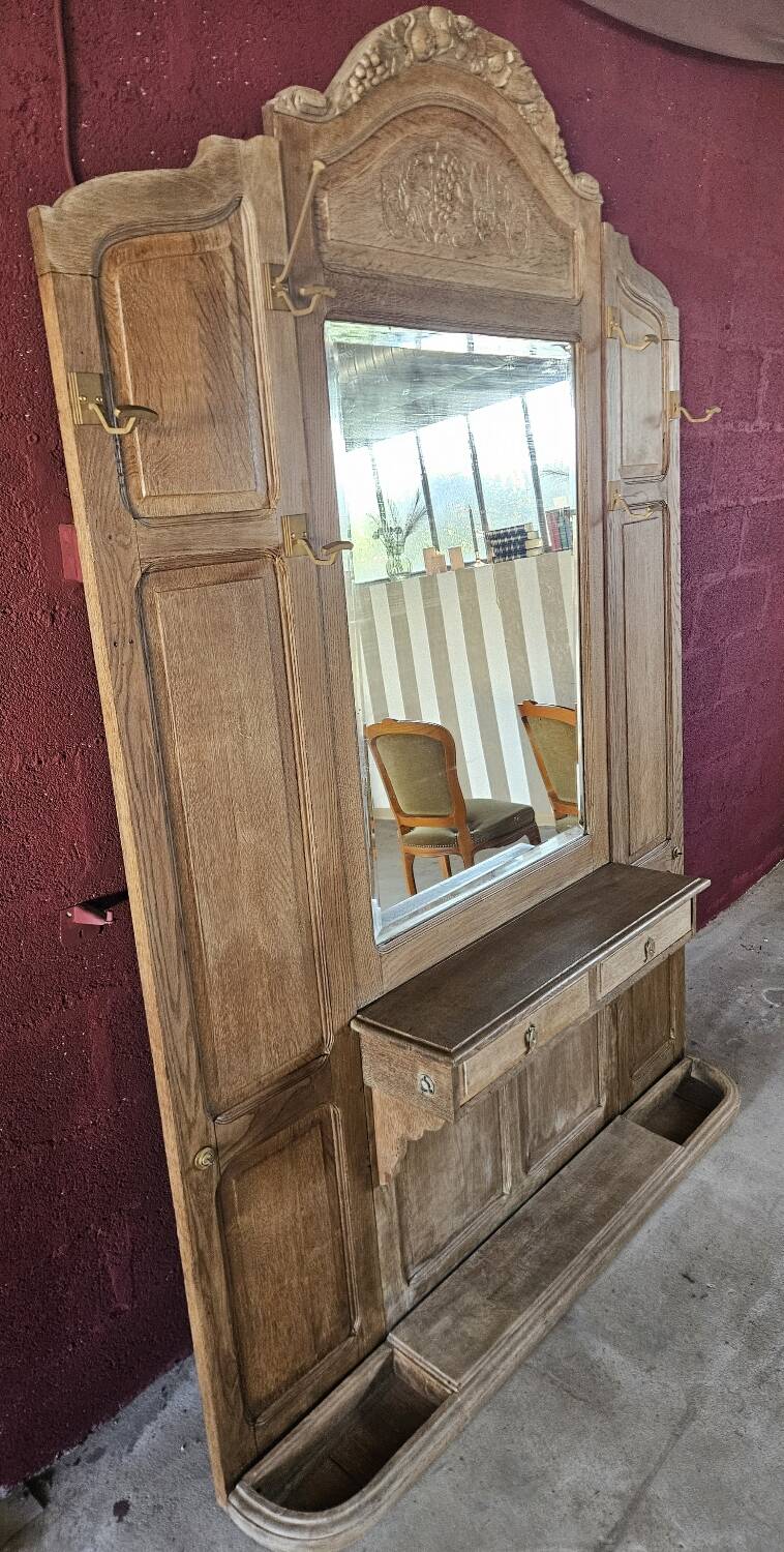 Antique oak entrance hall wardrobe. Mirror. Early 20th century.