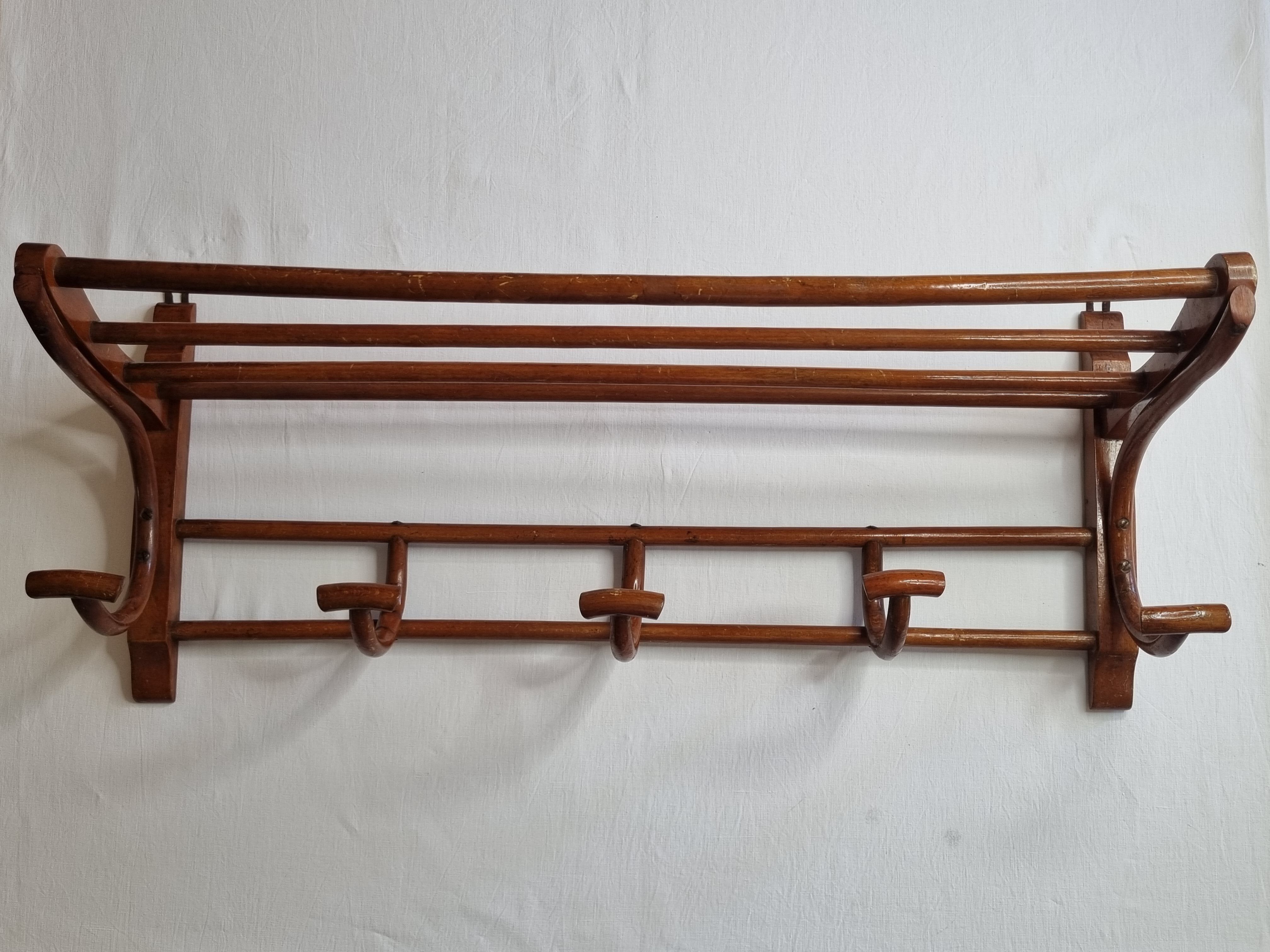 Old wall rack in curved wood, 1900s era