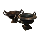 Former pair of iron cast Medici planters