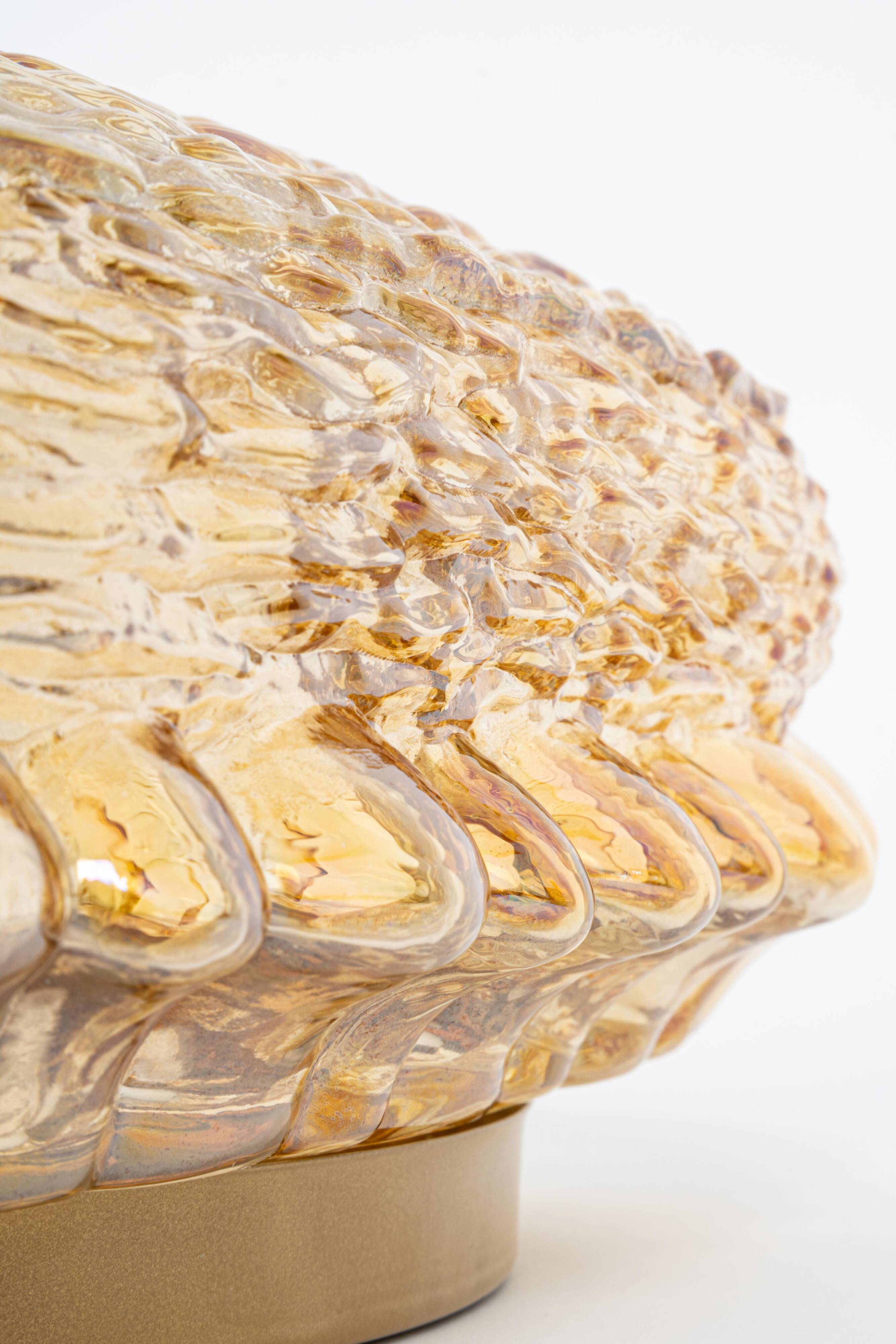 Amber glass wall light in the shape of a fingerprint, Germany, 1970s.