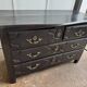 18th-century old chest of drawers, known as Parisian, with 4 drawers in a black patina.