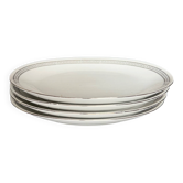 4 small oval porcelain dishes