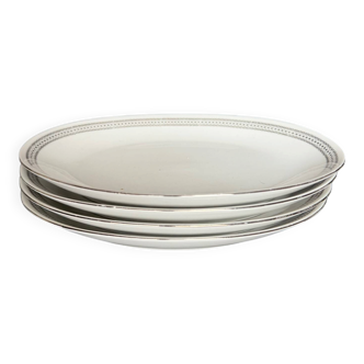 4 small oval porcelain dishes
