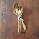 Golden coffee spoons
