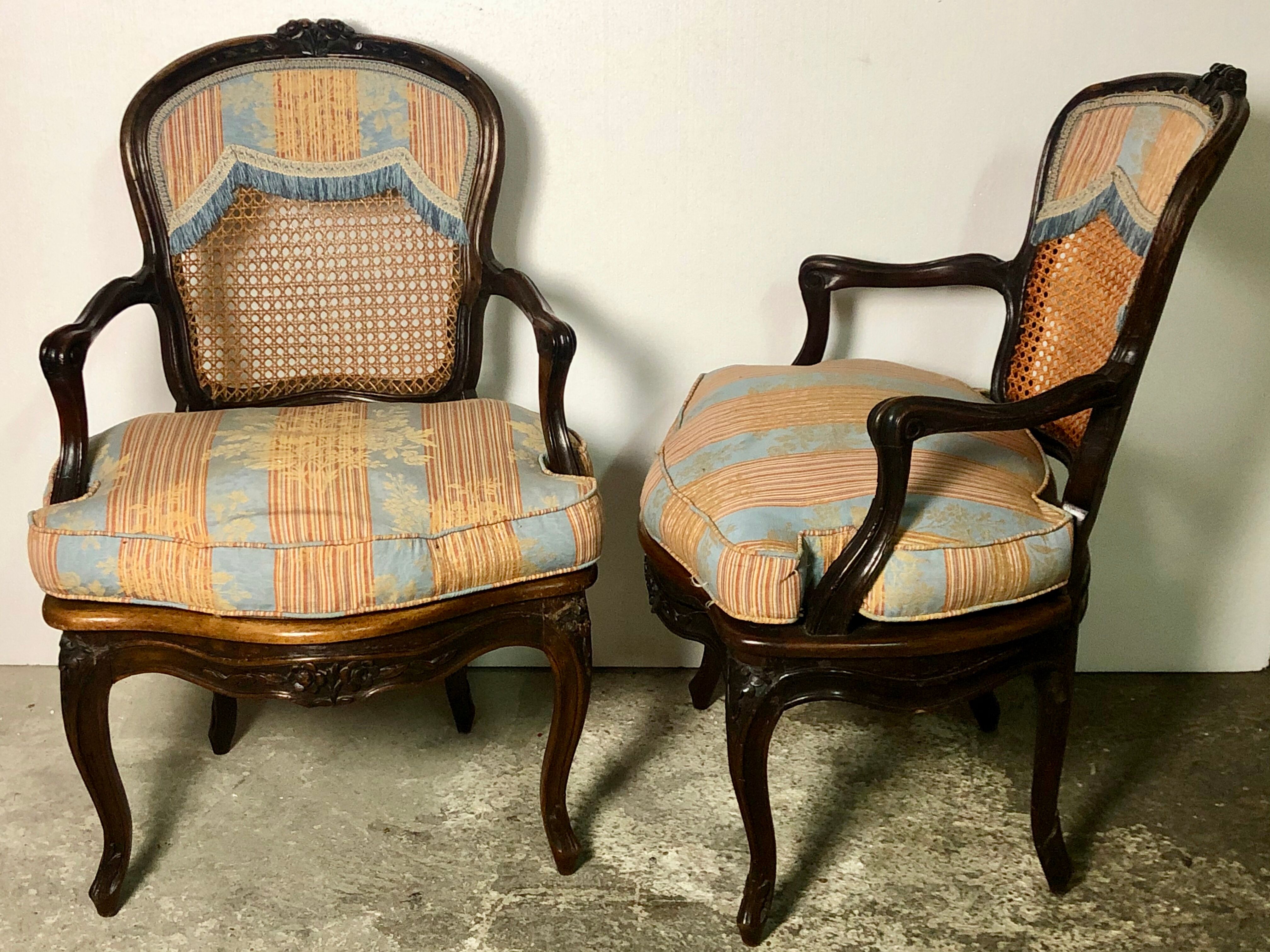 Convertible armchairs Louis XV era in walnut moulded and cannes