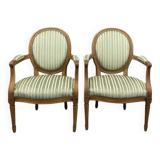 Paire de fauteuils de style Louis XVI en tissu rayé vert, XXème siècle