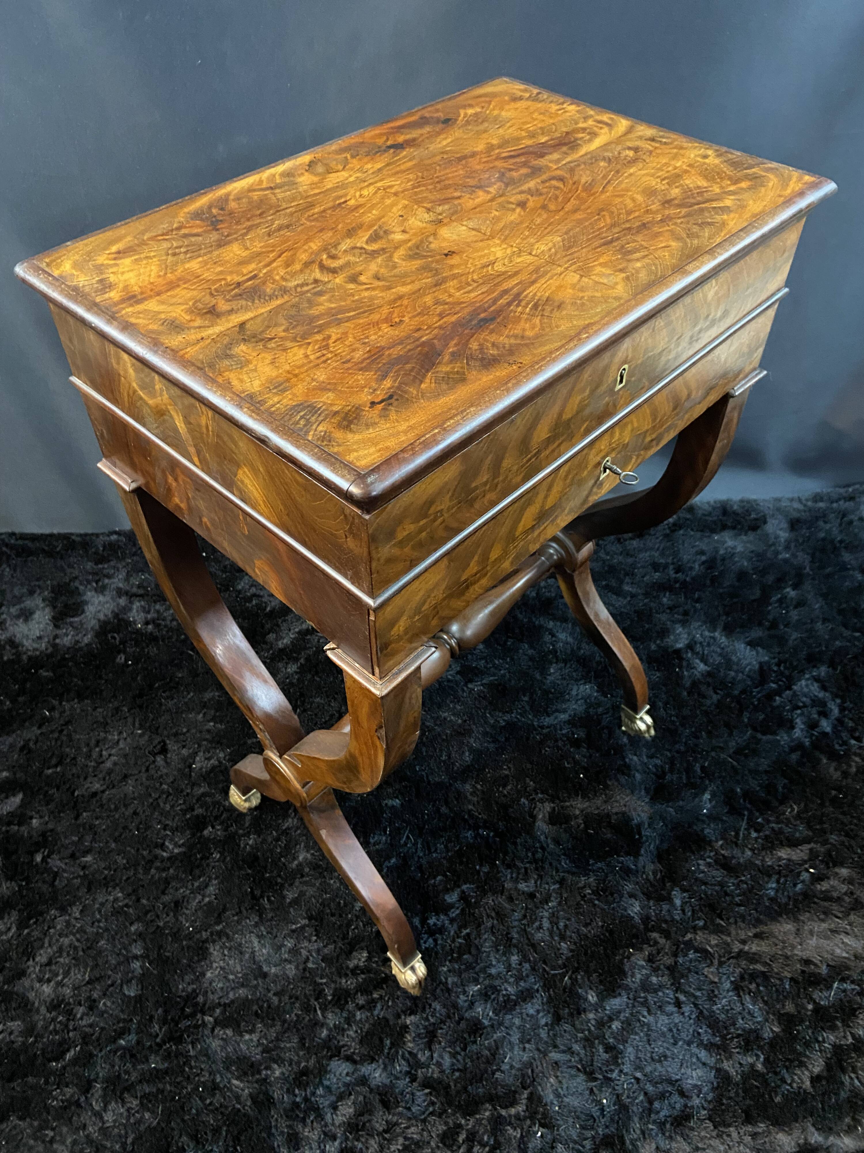 Louis-Philippe period mahogany writing desk with candlestick, 19th century