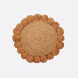 Mini round cushion with ochre wool pompoms