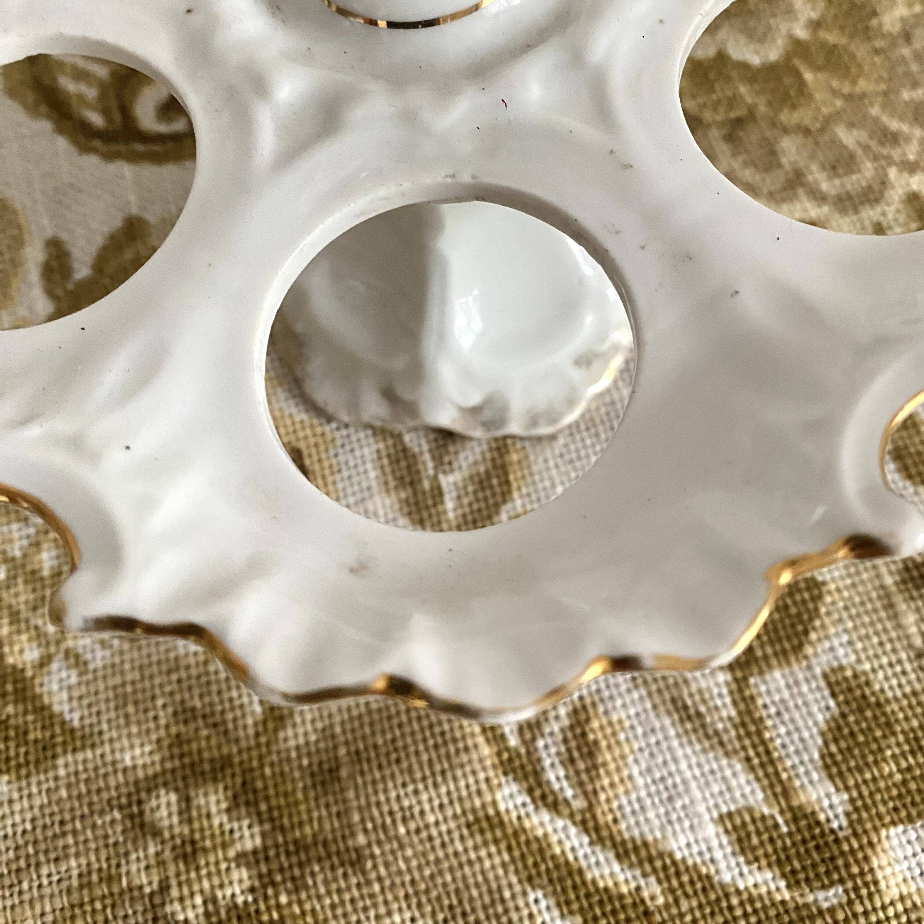 Early 20th century porcelain egg display