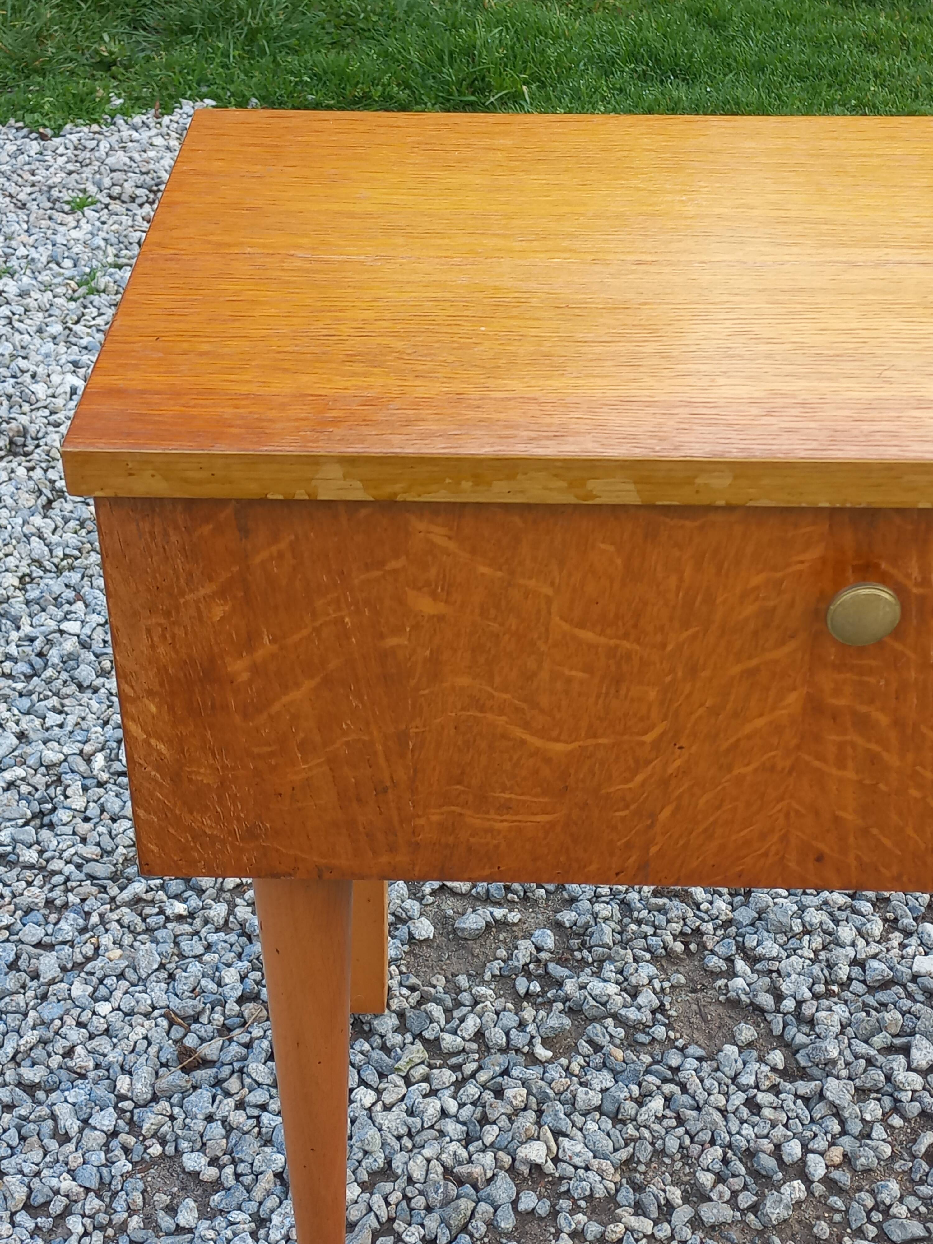 Vintage 1950s bedside table in blond oak with conical legs