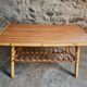 Vintage bamboo and rattan coffee table with magazine rack, French, circa 1960–1970.