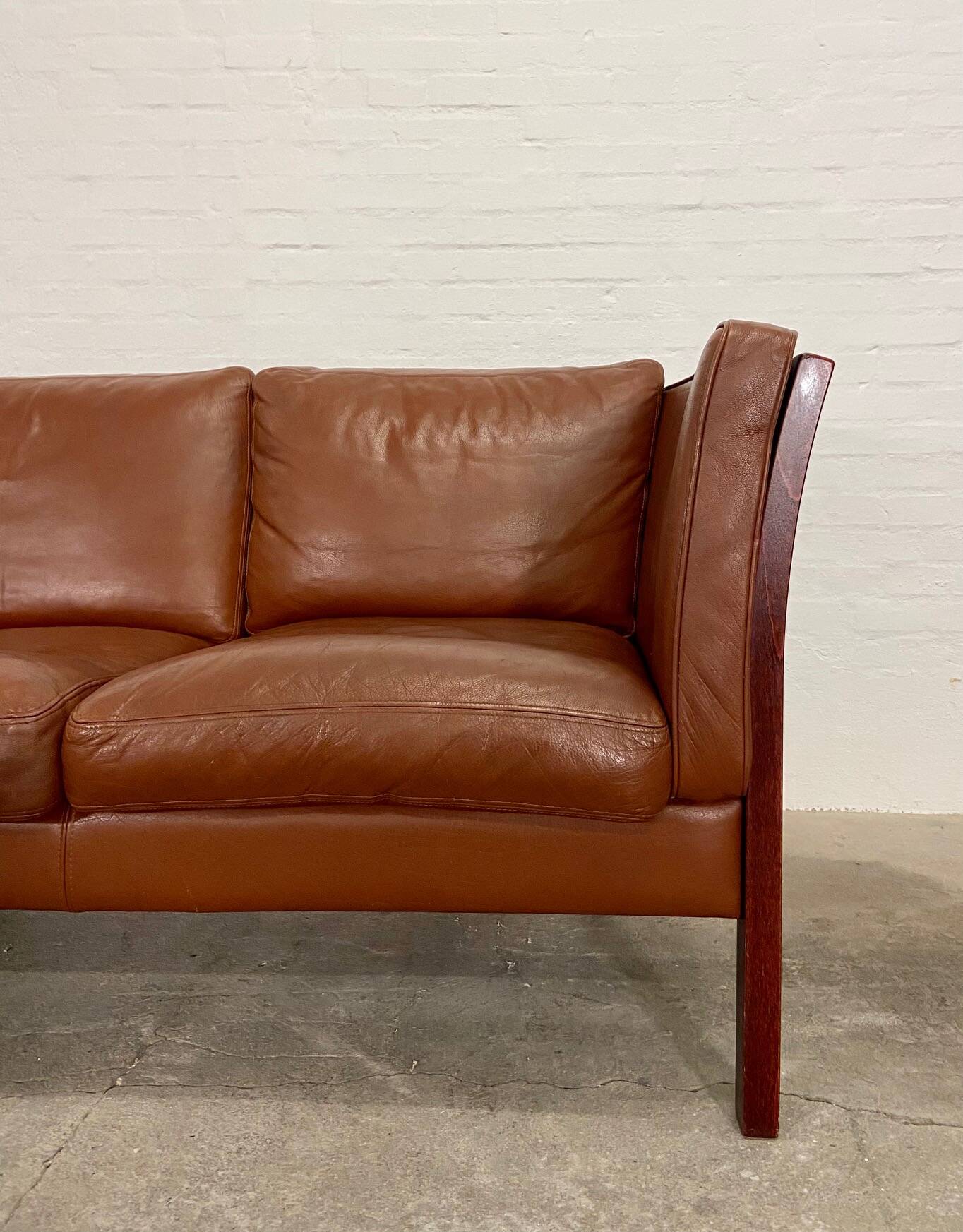 Vintage danish stouby dark cognac leather and rose stained beechwood frame 3 seater sofa