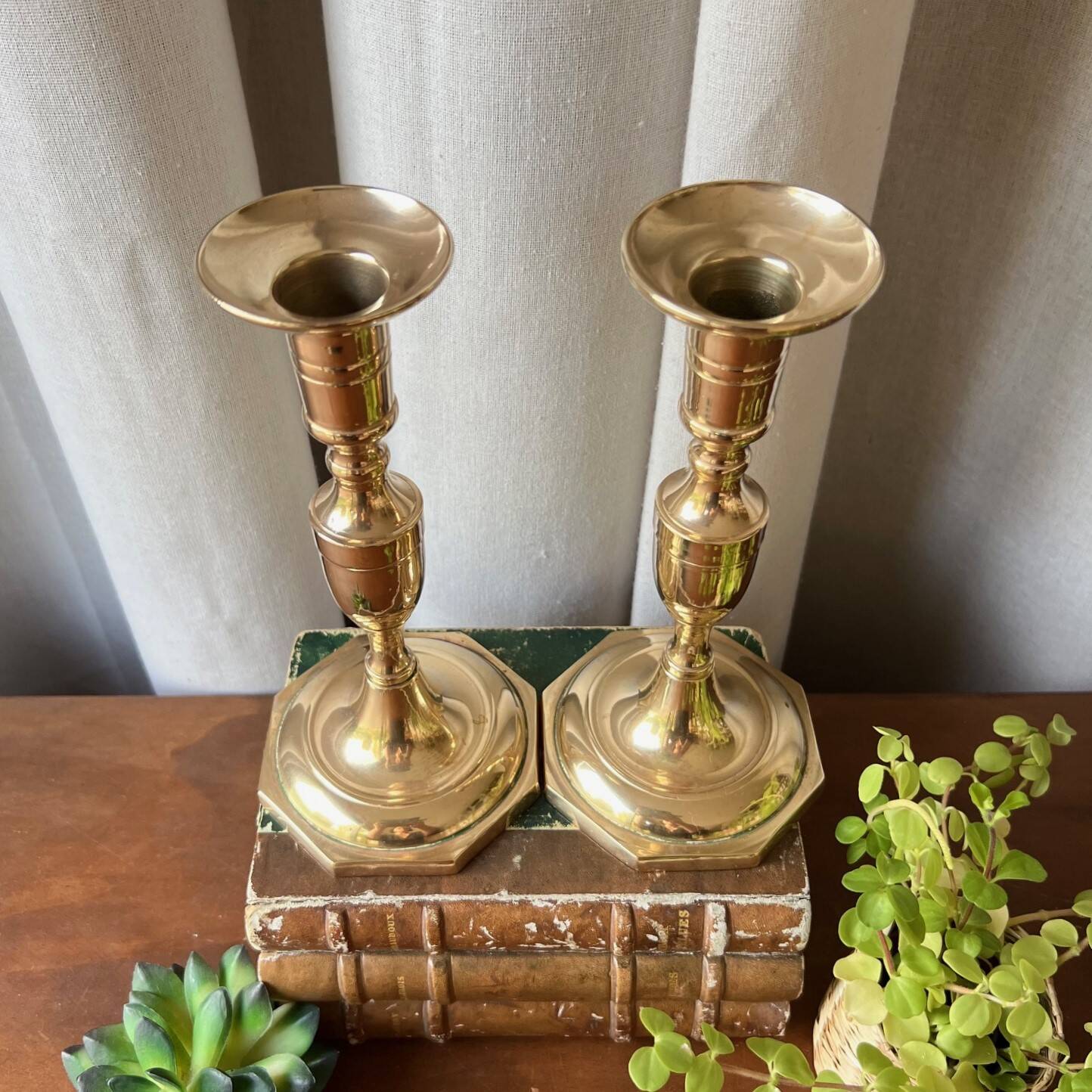 Duo of brass candlesticks