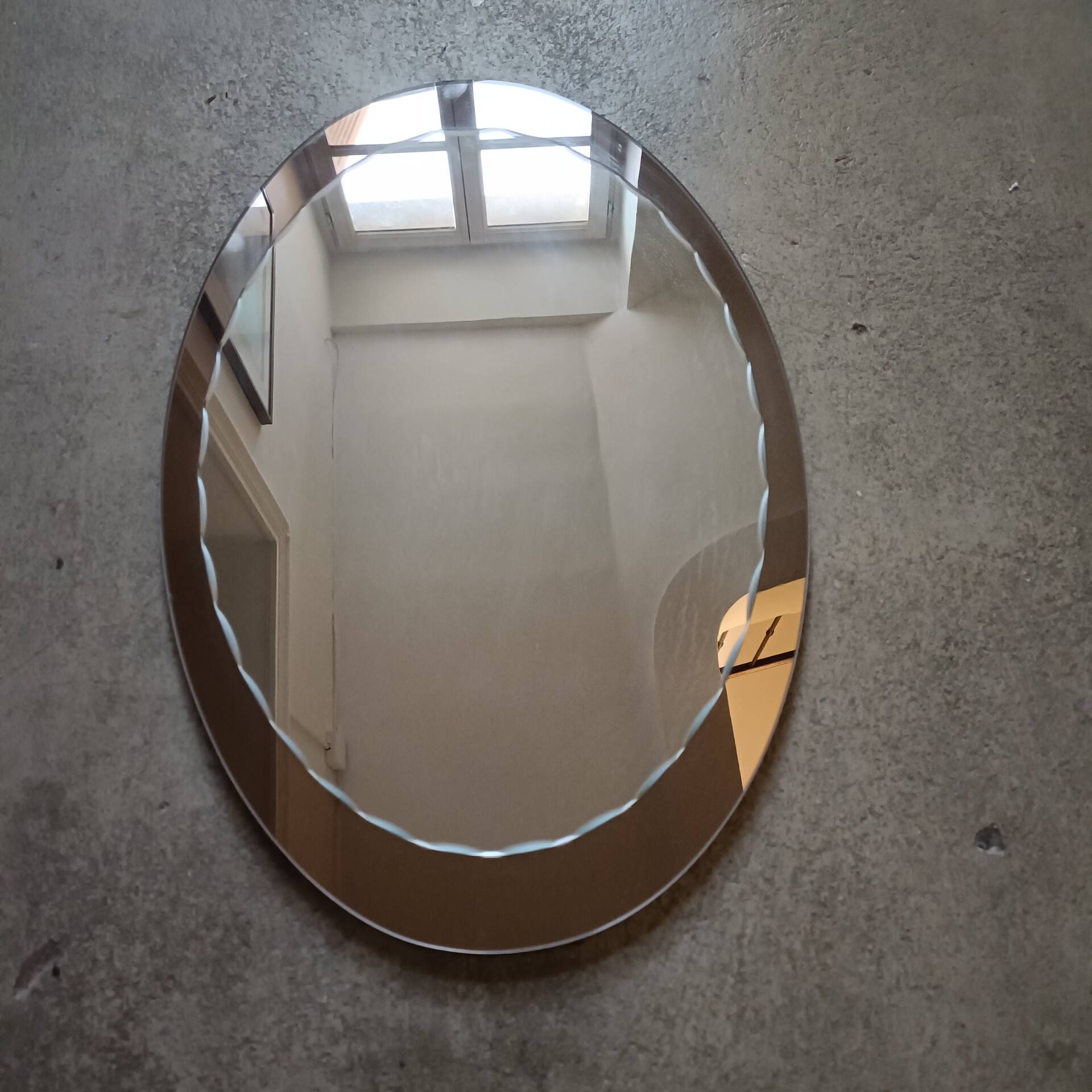 Bevelled oval mirror from the seventies