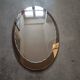 Bevelled oval mirror from the seventies