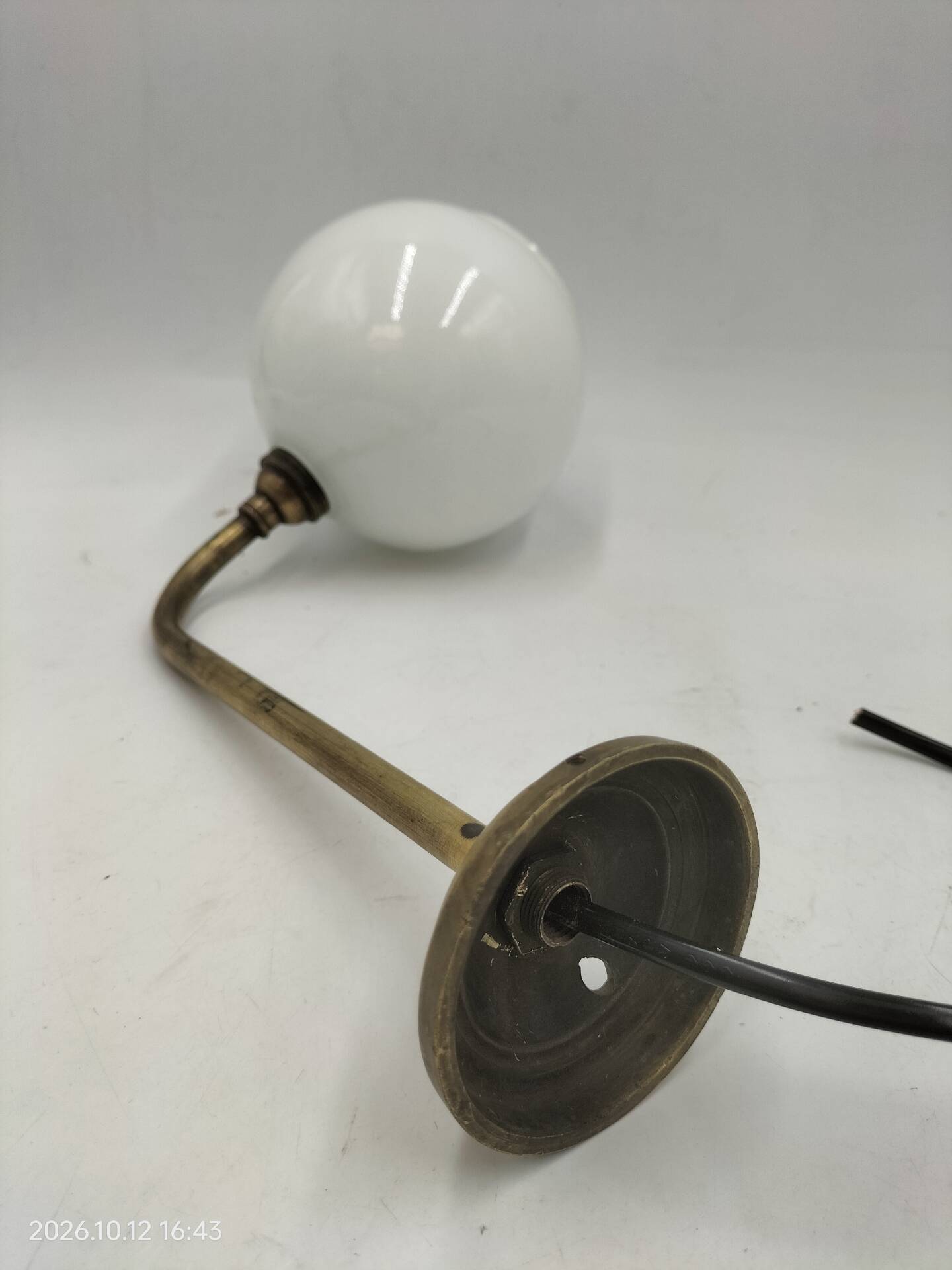 Brass and glass wall light